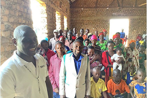 KFT Talemwa and HT Erisa Waswa with parents